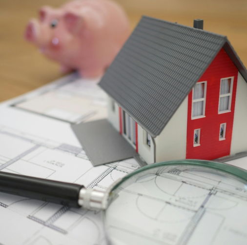white-and-red-wooden-house-beside-grey-framed-magnifying-glass.jpg white and red wooden house beside grey framed magnifying glass